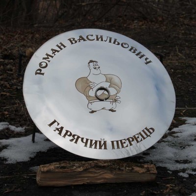 Лазерне гравіювання на кришці з нержавійки Лазерне гравіювання на кришці з нержавійки